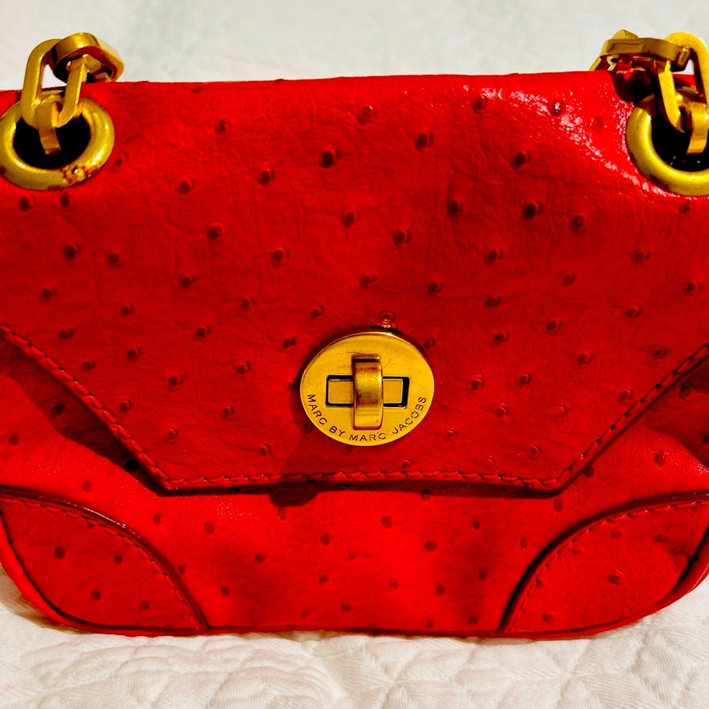 Marc by Marc Jacob’s small red ostrich leather purse with gold chain